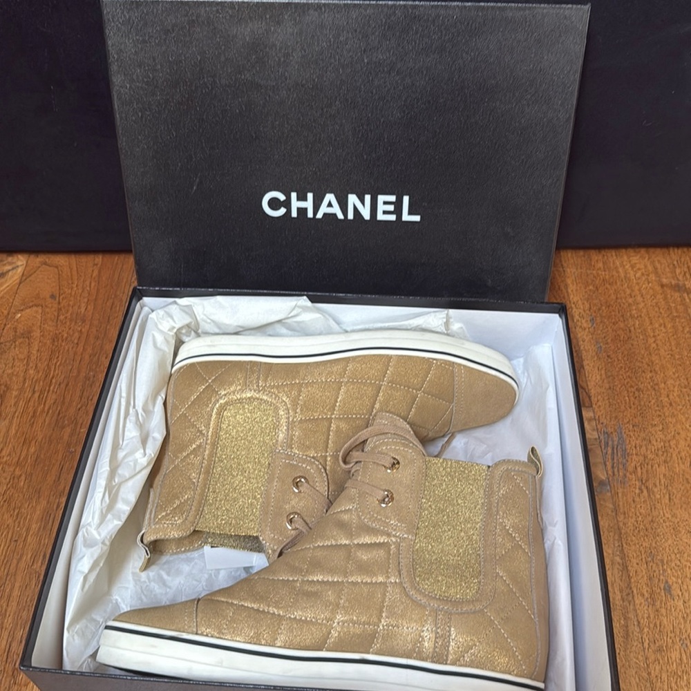 Chanel Quilted high top Sneaker in Gold